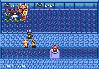 Capture d'écran montrant un boss dont les points de vie sont des pommes vertes. Le boss ressemble à un gros serpent.